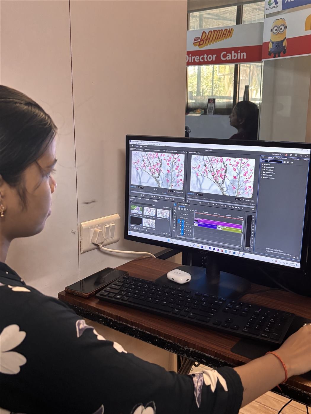 Student editing footage on Premiere Pro at Veda Vasai